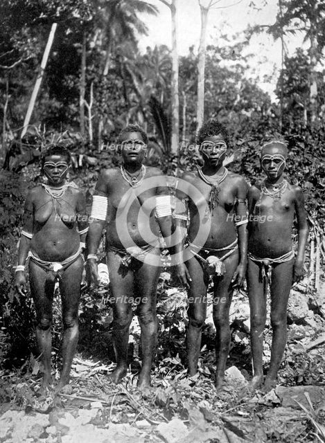 Women in festival attire, Melanesia, 1920.Artist: George Brown