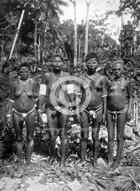 Women in festival attire, Melanesia, 1920.Artist: George Brown