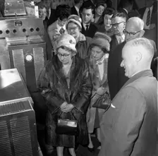Women in fur coats at a food exhibition, Wilsic, near Doncaster, South Yorkshire, 1961. Creator: Michael Walters