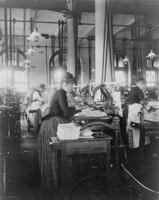 Women operating machinery at the Bureau of Printing and Engraving, Washington, D.C., 1889 or 1890. Creator: Frances Benjamin Johnston