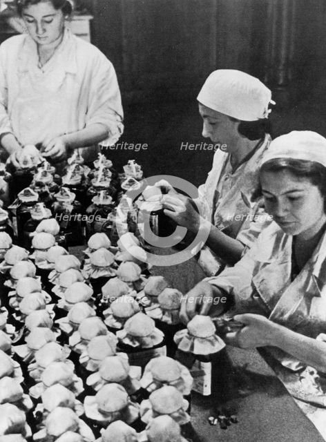 Women sealing flasks of donated blood, World War II, Moscow, 1941. Artist: Unknown