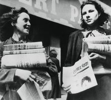 Women selling German newspapers, German-occupied Paris, 19 July 1940