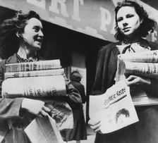 Women selling German newspapers, German-occupied Paris, 19 July 1940