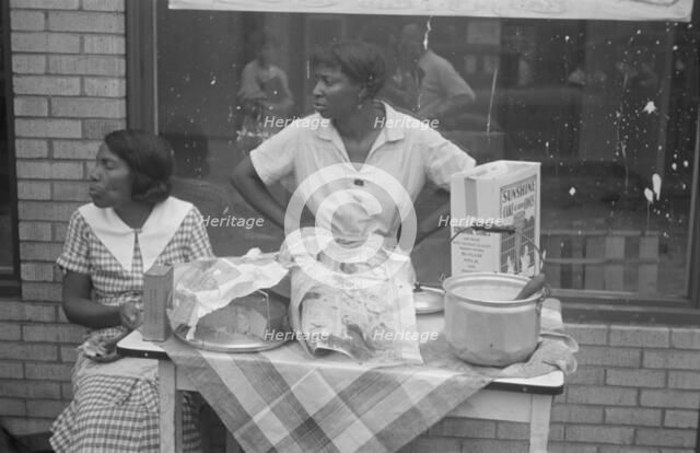 Women selling ice cream and cake, Scotts Run, West Virginia, 1935. Creator: Walker Evans.