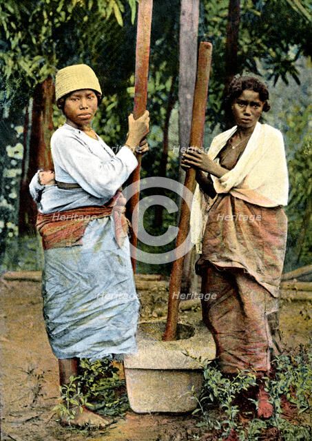 Women pounding rice, Madagascar,  late 19th century. Artist: Unknown