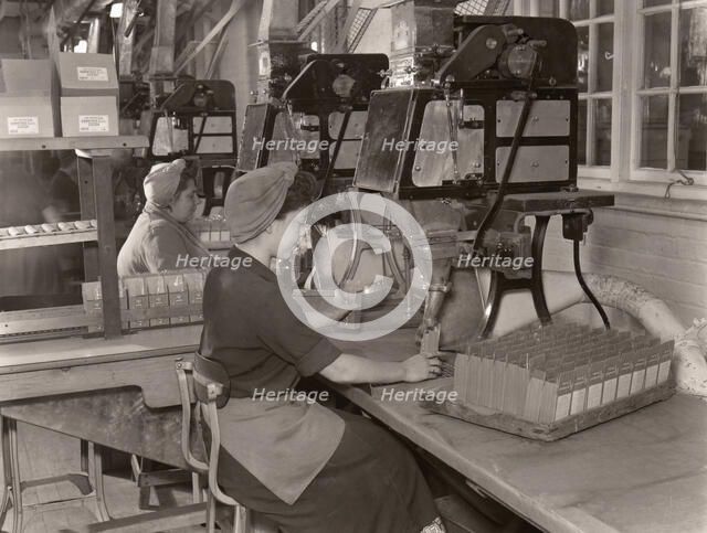 Women packing Elect Cocoa, Rowntree factory, York, Yorkshire, 1955. Artist: Unknown