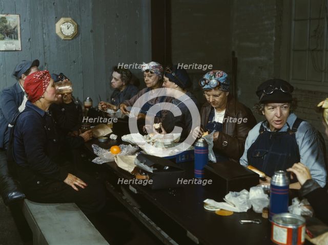Women workers employed as wipers in the roundhouse having lunch..., C&NWRR., Clinton, Iowa, 1943. Creator: Jack Delano.