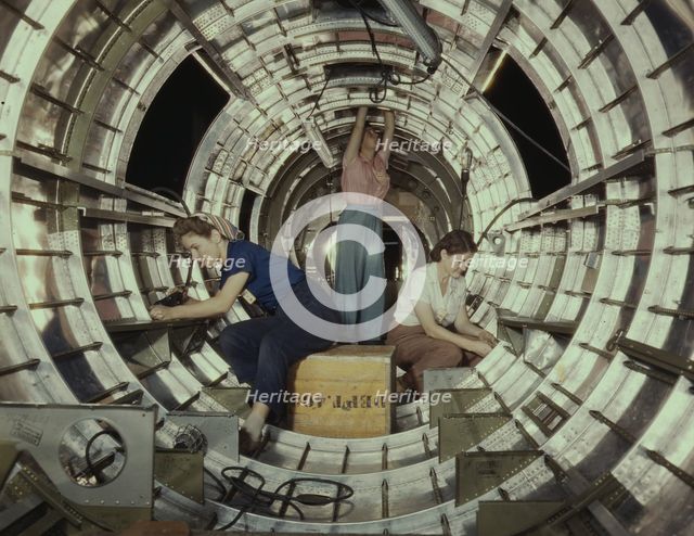 Women workers install fixtures and assem...Douglas Aircraft Company plant, Long Beach, Calif. , 1942 Creator: Alfred T Palmer.