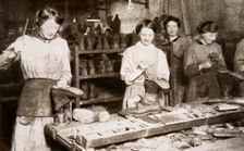 Women working in a boot repairing factory, Old Kent Road, London, World War I, c1914-c1918. Creator: S and G