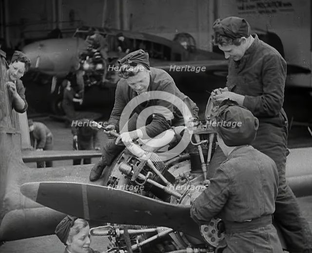Women Working on an Aeroplane Engine, 1942. Creator: British Pathe Ltd.