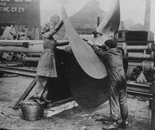 Women working on propeller, Eng. [i.e. England], between c1915 and 1917. Creator: Bain News Service