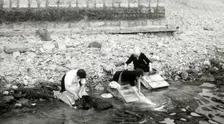 Women washing clothes on the shore of Lago Maggiore, Isola Bella, Italy, c1955. Creator: Arthur Charles Kirby Ware