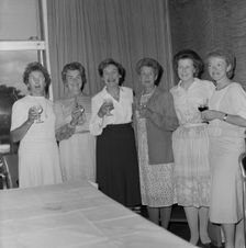 Women with celebratory drinks at the retirement presentation of Mary Coldicott
, 01/08/1986. Creator: John Laing plc