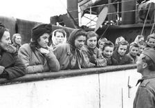 Women talking to a soldier, Trelleborg harbour, Sweden, May 1945