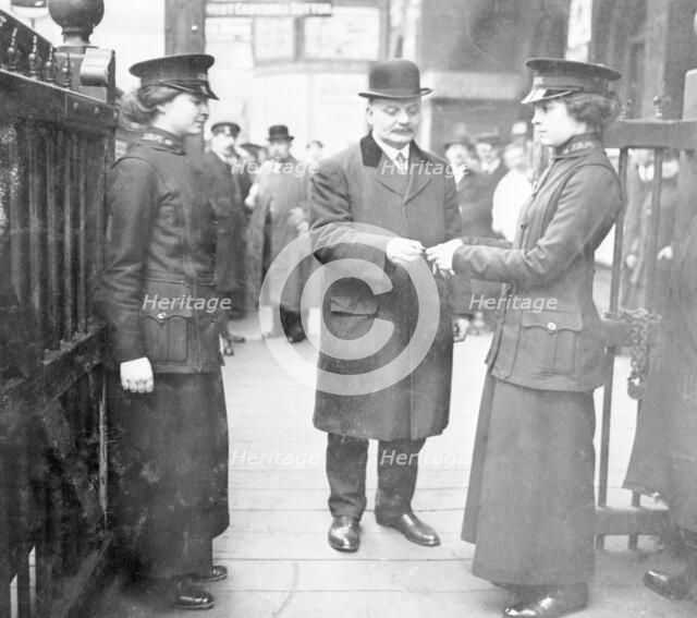 Women ticket collectors, London Bridge Station, London, May 1915. Artist: Unknown