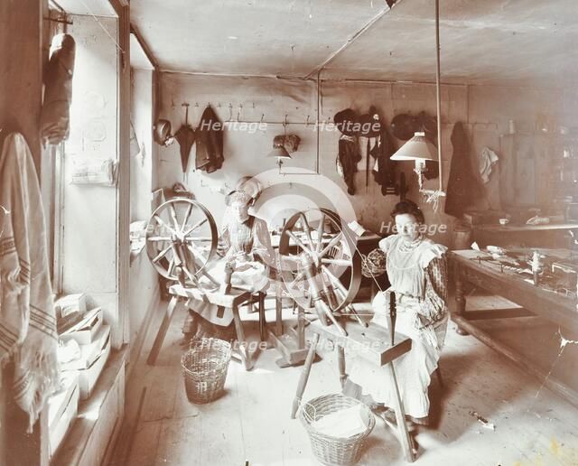 Women using spinning wheels, Bethnal Green, London, 1908. Artist: Unknown.
