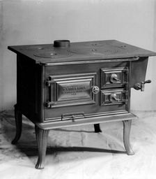 Wood burning stove, manufactured by Landskrona Foundry, Sweden, 1900. Creator: Unknown