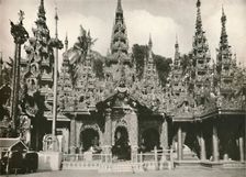 Wood Carved Shrines with Glass Mosaic work at the Shwe Dagon Pagoda, Rangoon 1900. Creator: Unknown