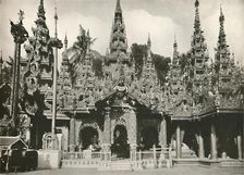 Wood Carved Shrines with Glass Mosaic work at the Shwe Dagon Pagoda, Rangoon 1900. Creator: Unknown