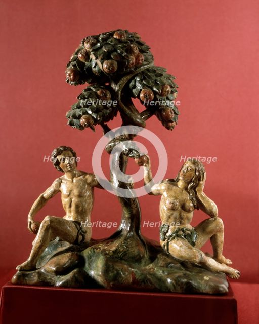 Wood carving representing 'The Dream of paradise with Adam and Eve'.