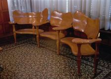 Wood sofa in the dining room of the Casa Batllo, 1904-1906, designed by Antoni Gaudi