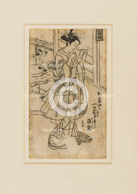 Woodblock print - Onoe Kikingoro I as a woman reading a book, 18th century Artist: Okumura Masanobu.