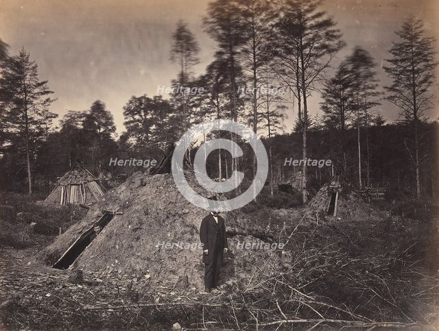 Woodchoppers' Huts in a Virginia Forest. On the Orange & Alexandria Railroad. Wood Su..., June 1863. Creator: Andrew Joseph Russell.