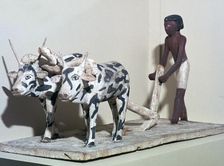 Wooden model of a man ploughing with oxen, from Egypt, Middle Kingdom, c2040-1750 BC