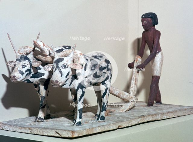 Wooden model of a man ploughing with oxen, from Egypt, Middle Kingdom, c2040-1750 BC. Artist: Unknown