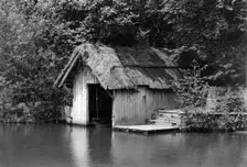 Wooden boathouse beside the River Rother, Woolbeding, West Sussex, c1900. Artist: Farnham Maxwell Lyte