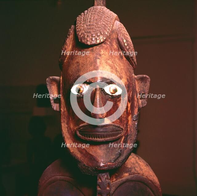 Wooden figure from New Ireland, Melanesia. Artist: Unknown.