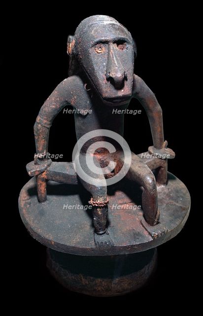 Wooden figure of a sea spirit, with head in the form of a shark, from the Solomon Islands. Artist: Unknown