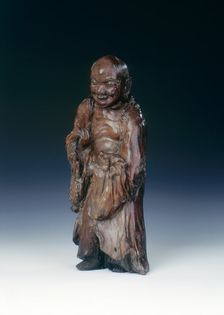 Wooden Liu Hai figure with three-legged toad, early Qing dynasty, China, c18th century. Creator: Unknown