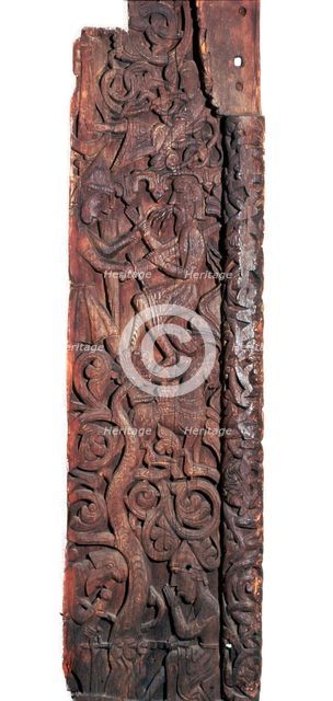 Wooden portal of Hylestad church, showing Sigurd roasting the dragon's heart. Artist: Unknown