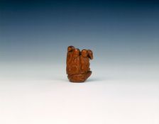 Wooden toggle of a monk, monkey, pig and horse on the back of a turtle, China, 17th century. Creator: Unknown
