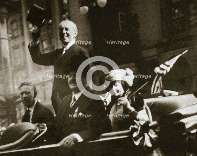 Woodrow Wilson returns from Paris after the signing of the Treaty of Versailles, 1919. Artist: Unknown