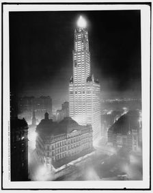Woolworth Building at night, New York City, c.between 1910 and 1920. Creator: Unknown