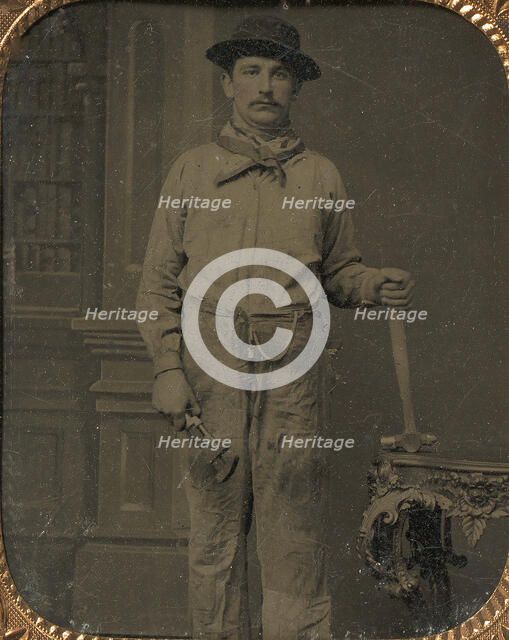 Workman Holding a Wrench and Hammer, 1860s. Creator: Unknown.