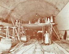 Workmen tiling the Rotherhithe Tunnel, London, December 1907