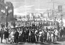 Workmen waiting to be engaged in the Place of the Hotel de Ville, Paris, 1869. Creator: Unknown