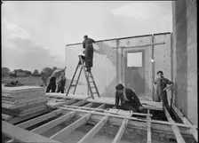 Workmen assembling a Swedish prefabricated house, 1945. Creator: Ministry of Works