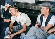 Workmen in an English inn listening to Mr. Churchill 1942. Creator: Unknown