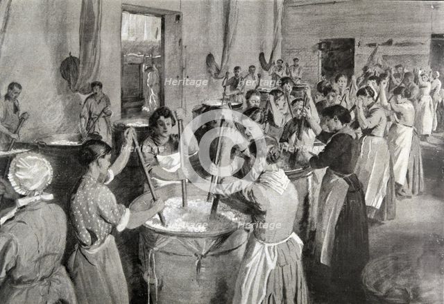 Workmen kneading the roses in fat to obtain an ointment where the perfume will be..., 1922. Creator: Etienne Cournault  (1891-1948).