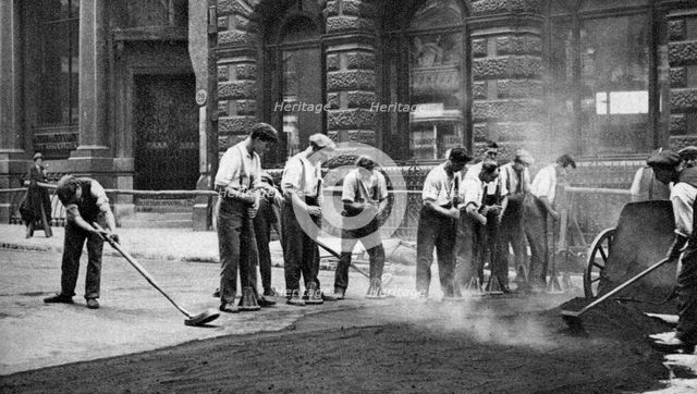 Workmen laying tar and asphalt in Cornhill, London, 1926-1927. Artist: McLeish