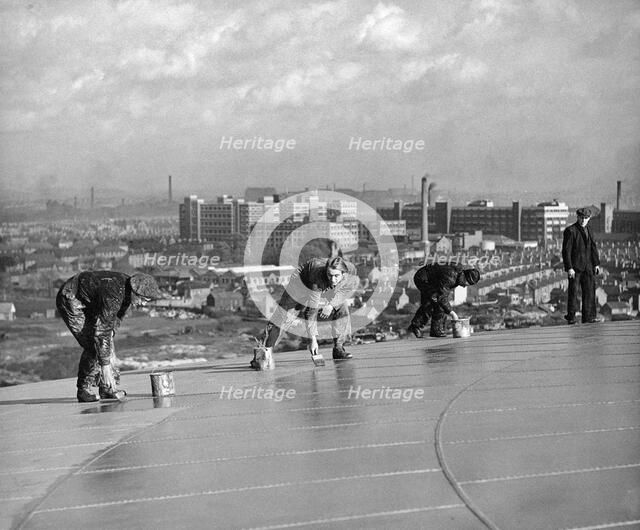 Workmen painting the top of Radford Gasometer, Nottingham, Nottinghamshire, c1949. Artist: Edgar Lloyd