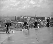 Workmen painting the top of Radford Gasometer, Nottingham, Nottinghamshire, c1949. Creator: Edgar Lloyd