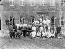Workmen posing outside a house with a bullock cart, Kingston Lisle, Oxfordshire, c1860-c1922. Artist: Henry Taunt