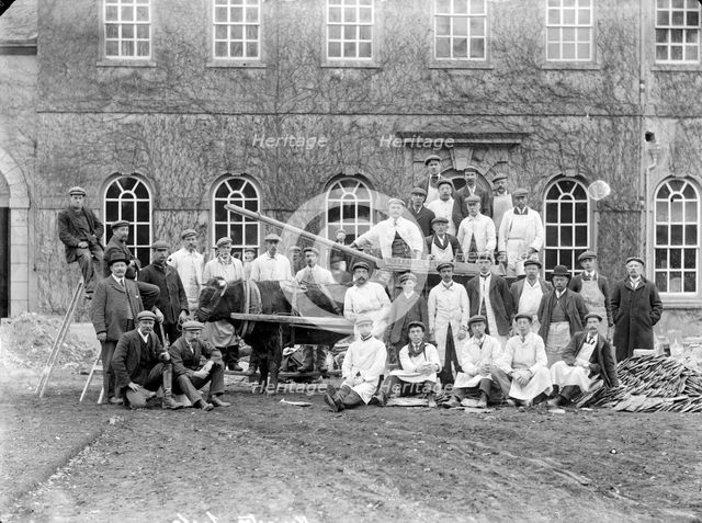 Workmen posing outside a house with a bullock cart, Kingston Lisle, Oxfordshire, c1860-c1922. Artist: Henry Taunt