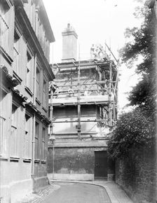 Workmen renovating the crumbling Headington stone, New College, Oxford, Oxfordshire, 1908. Artist: Henry Taunt