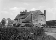 Workmen repairing a chimney of a cottage at Shellingford, Oxfordshire, c1860-c1922. Artist: Henry Taunt